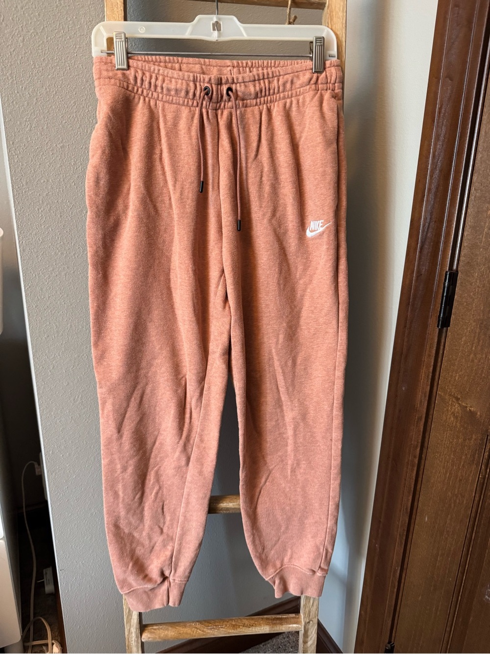 Nike women’s Rust Pink Fleece Joggers with Drawstring